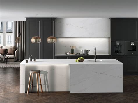 Marble Countertops. . Ethereal glow silestone with white cabinets
